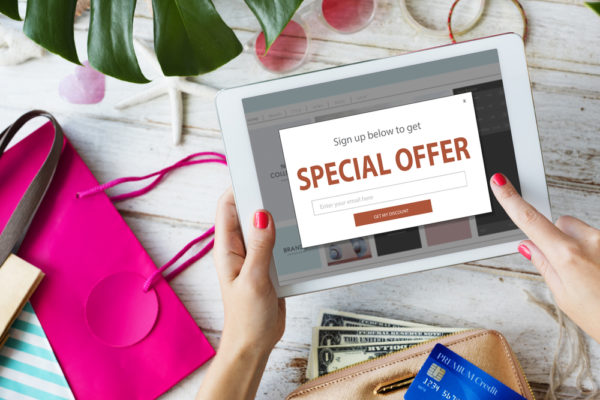 Special offer modal window on tablet with wrapping detritus around