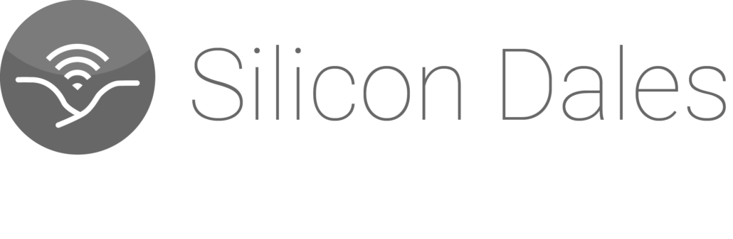 Silicon Dales logo, which has a white motif that looks like some hills, with a wifi style signal emanating from between those hills (in the valley) in Yorkshire, valleys are called Dales. The words "Silicon Dales" are to the right of this circular logo.